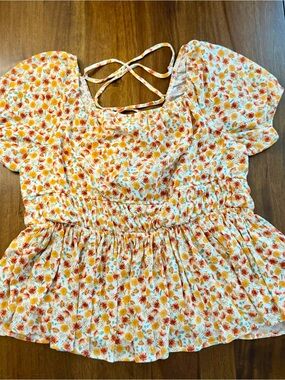 TorridFloral Flutter Sleeve Peplum Top - White with Orange & Yellow Floral Print